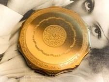 Kigu gold tone vintage powder