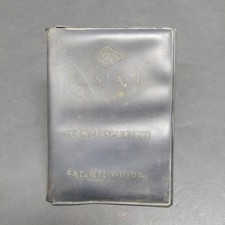 Porta documenti con due licenze di conduttore anni '50. Macchie e ruggine