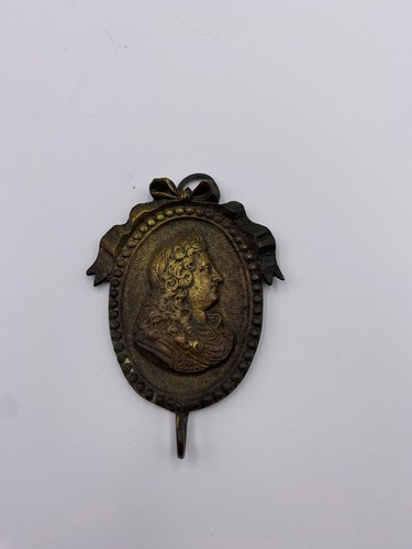 Antico gancio per orologio