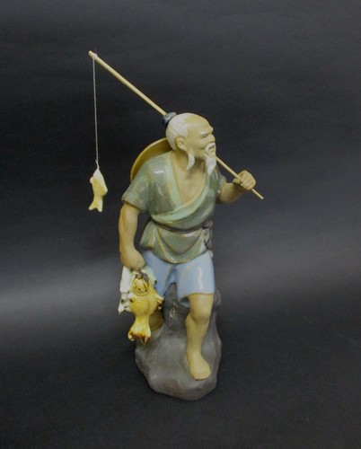 Statua pescatore orientale - ✅,