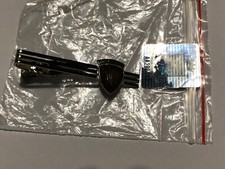 FERMACRAVATTA IN METALLO CON