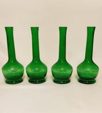 Set di 4 bottiglie vintage in vetro verde con forma ad ampolla