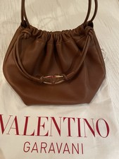 AUTENTICO nuovo con etichette