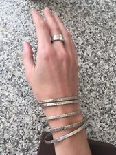 Parure in Argento composta da 5 Bracciali rigidi ed un Anello lavorati a mano! 