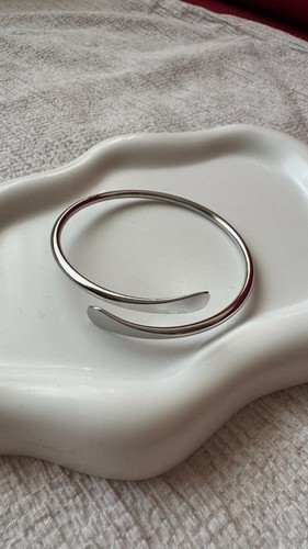Bracciale rigido argentato