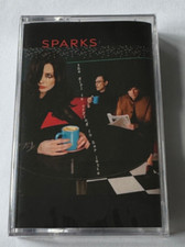 Sparks - The Girl Is Crying In Her Latte - GLITTER CASSETTE - BRAND NEW SEALED