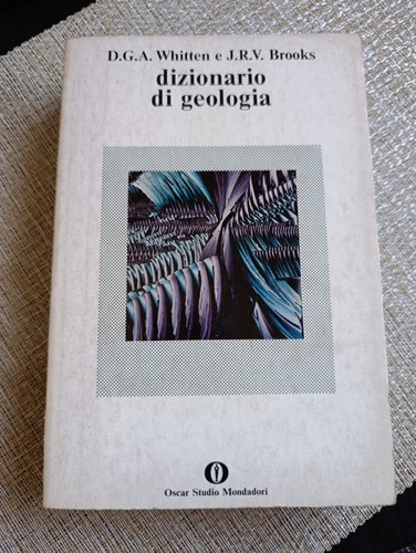 Dizionario - , di