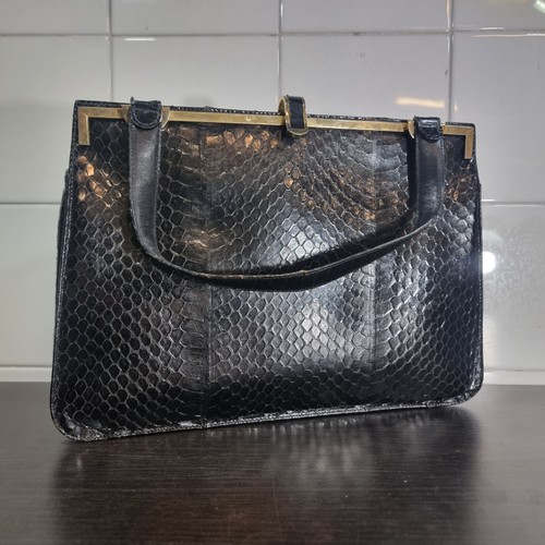 Borsa pelle pitone - in,