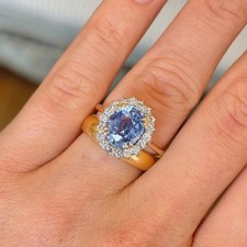 Anello aureola zaffiro blu