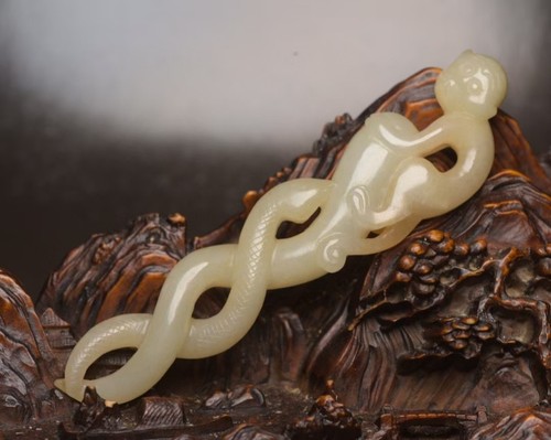 Statuina scimmia serpente