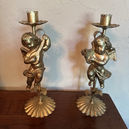 Coppia portacandele putti