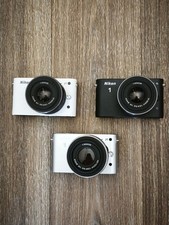 Nikon J1, tre fotocamere