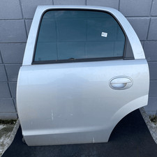 13114690 Porta post. SX OPEL