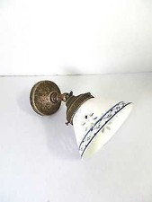 Applique in ottone brunito da