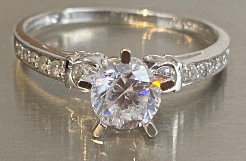 Anello solitario oro 1 - 8, kt