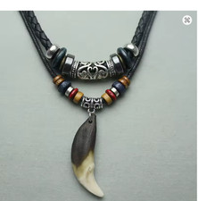 Collana con ciondolo dente di