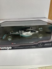 Auto ibrida F1 Burago scala