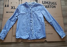 Camicia a righe blu e bianche