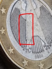 Moneta da 1€ Germania 2004 A con Eccesso di Materiale a sx tra l'Ala e il busto