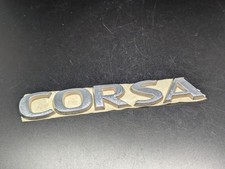 OPEL CORSA LOGO SIGLA EMBLEMA FREGIO STEMMA SCRITTA BADGE TARGA NOME TARGHETTA