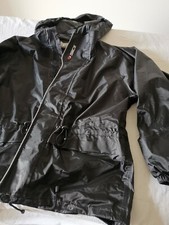 Tuta Antipioggia Sidi nuova.