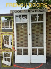 Porte doppie in legno vetro