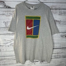 T-shirt vintage Nike bianca etichetta sfida campo tennis Agassi logo grafico grande