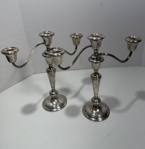 Coppia ammaccature candelabri