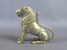 Scultura leone etnico ottone