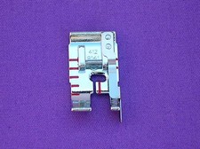 PIEDE PER CUCIRE BORDO 1/4"