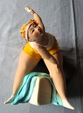 Statua in porcellana di Emilio