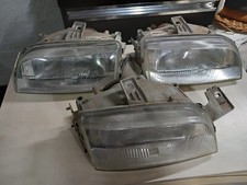 stock 3 fanali anteriori FIAT PUNTO 1 SERIE ORIGINALI FIAT CARELLO