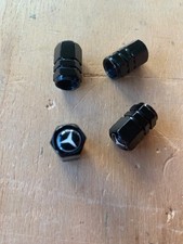 Set 4 Tappi gomme mercedes alluminio neri con logo mercedes