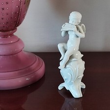 Figurine - Puttino player with
