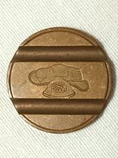 Gettone telefonico IPM 7911 Errore conio cornetta e tondello decentrato