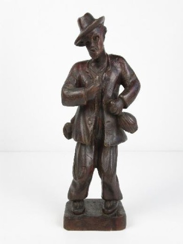 Scultura uomo legno intagliato