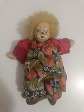 Bambola pagliaccio con viso in