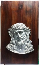 Bassorilievo Sacro con volto