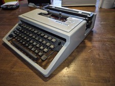 Olivetti Dora avec bobines métal et ruban neuf
