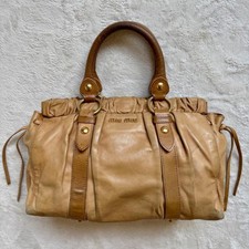 Borsa MIU MIU vitello lux manico superiore in pelle marrone Y2K oro ferramenta donna