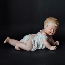 Statuina in porcellana biscuit - Piano baby -  Fine '800 /Inizi '900 (cod. 1234)