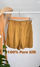 Pantaloncini a vita alta H&M