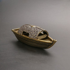 Antica scultura barca da pesca