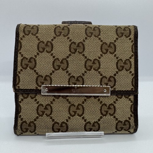 Gucci portafoglio bifold in - gucci, gg