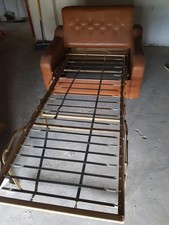 poltrona letto singolo  seminuova, in pelle colore marrone chiaro