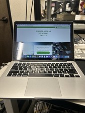 Apple MacBook Pro Retina metà