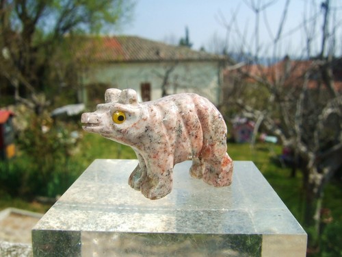 Animali incisi pietra - in,