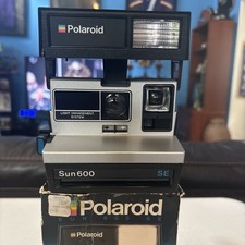 Polaroid Sun 600 SE fotocamera terrestre flash pellicola istantanea vintage rara con cinturino