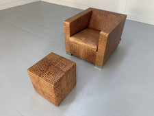 Poltrona e pouf Minotti "linea