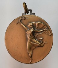 Medaglia premio liberty fiaccola olimpica sportiva